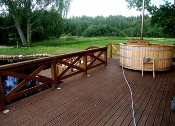 Фото номера Дом с 2 спальнями Дома для отпуска Vilks un Briedis Holiday Home &amp; Wellness Area г. Смилтене 13