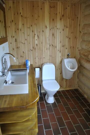 Фото номера Дом с 2 спальнями Дома для отпуска Vilks un Briedis Holiday Home &amp; Wellness Area г. Смилтене 23