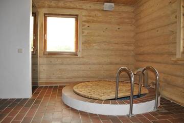 Фото номера Дом с 2 спальнями Дома для отпуска Vilks un Briedis Holiday Home &amp; Wellness Area г. Смилтене 30